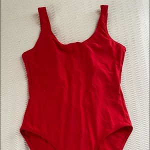 Bright red one piece bathing suit